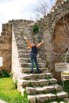 Royalty Free Photo of a Person at the Bellapais Abbey in Kyrenia