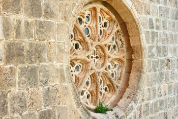 Royalty Free Photo of a Wall Apart of the Bellapais Abbey in Kyrenia, Northern Cyprus