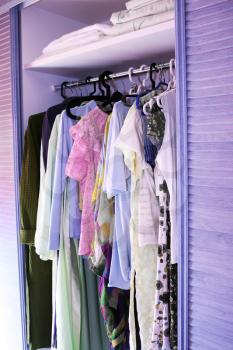 Royalty Free Photo of Clothes in a Closet