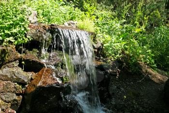 Royalty Free Photo of a Waterfall in a Forest in Jermuk, Armenia