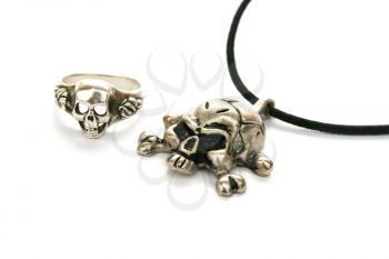 Royalty Free Photo of a Skull Ring and Necklace