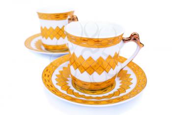 Royalty Free Photo of Cups on Saucers