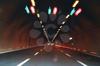 Royalty Free Photo of Lights and Cars in a Tunnel