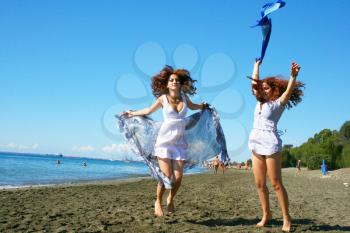 Royalty Free Photo of Two Women on the Beach