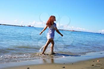 Royalty Free Photo of a Woman on the Beach