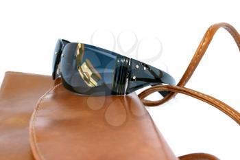 Royalty Free Photo of Sunglasses on a Purse