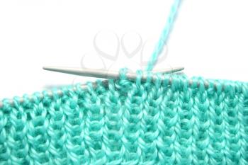 Royalty Free Photo of Yarn and Knitted Needles
