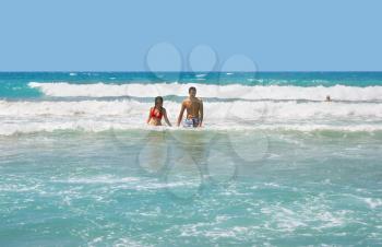 Royalty Free Photo of a Couple in the Sea