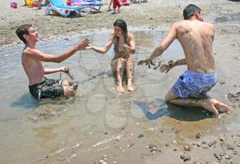 Royalty Free Photo of People Playing on the Beach