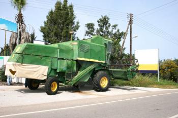 Royalty Free Photo of a Green Combine