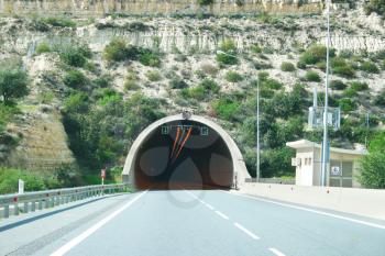 Royalty Free Photo of a Road to a Tunnel