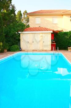Royalty Free Photo of a House and Swimming Pool