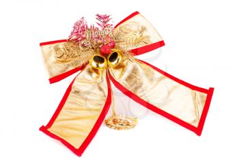Christmas ribbon decoration with bells isolated on white background.