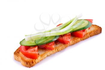 Long rusk sandwich with tomato, cucumber and onion isolated on white background.