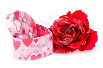Red rose and gift box isolated on white background.