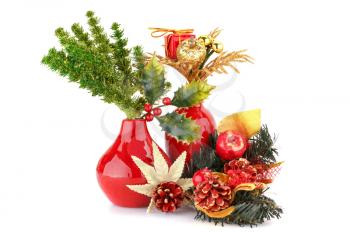 Christmas decoration in red vases isolated on white background.