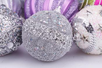 Christmas colorful balls on gray background.