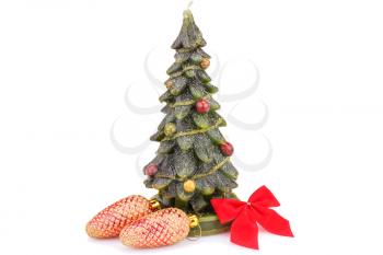 Fir tree candle, cones and red ribbon isolated on white background.