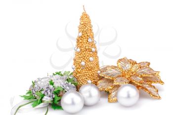 Christmas candle, balls and  flower decorations isolated on white background.