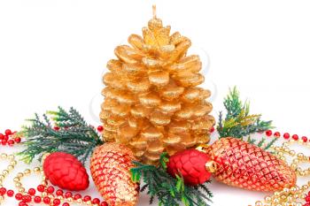 Christmas candle, cones and  fir tree branches isolated on white background.