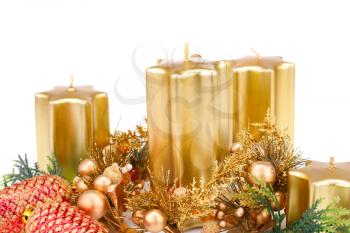 Christmas candles and decoration isolated on white background.