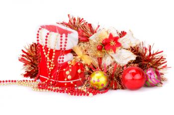 Christmas decoration with Santa's red boot, garland, balls, beads isolated on white background.