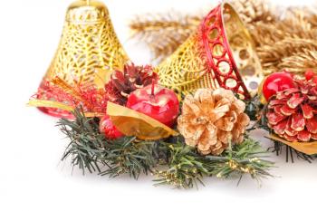 Christmas decoration with bells,cones on white background.