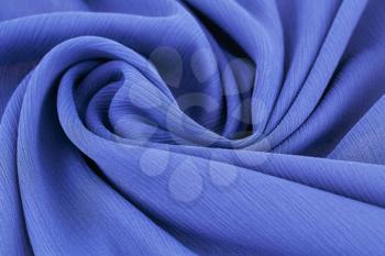 Violet fabric as a background.