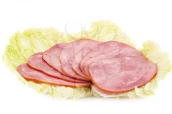 Ham on lettuce isolated on white background.