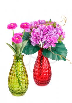 Pink fabric flowers in vases isolated on white background.