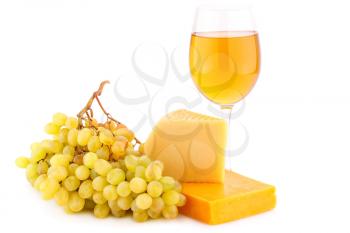 Two pieces of cheese, grapes and glass of wine isolated on white background.