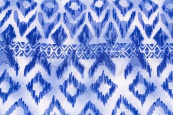 Blue and white fabric background closeup picture.