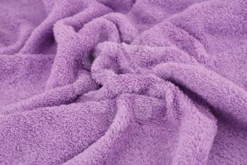 Violet towel texture as a background.