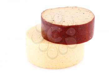 Two pieces of round cheese isolated on white background.