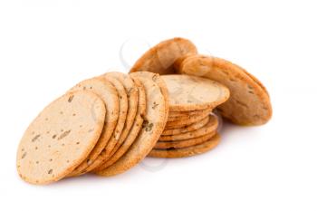 Pile of round cookies isolated on white background.