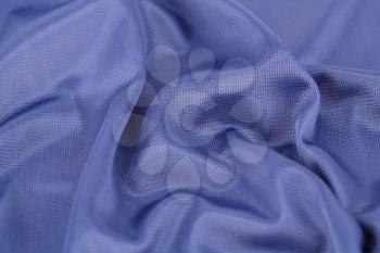 Blue silk fabric for background.