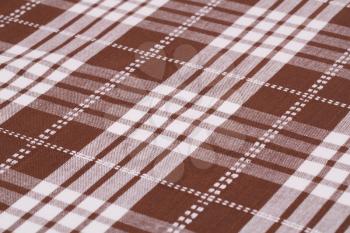 Striped tablecloth texture as a background, closeup picture.