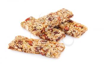 Cereal bars with different nuts and seeds isolated on white background.
