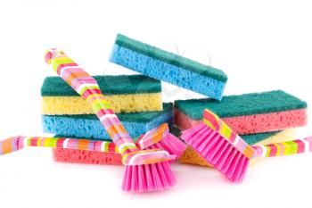 Colorful sponges and brushes isolated on white background.