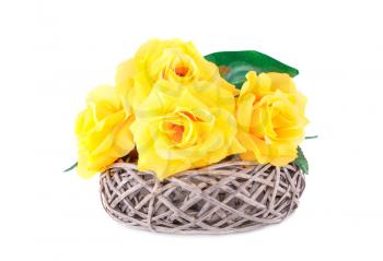 Yellow fabric flowers in vase isolated on white background.