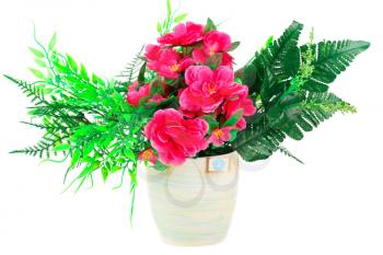 Pink fabric flowers in vase isolated on white background.