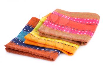 Colorful kitchen towels isolated on white background.