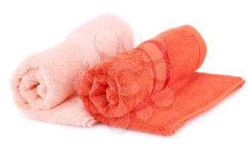 Colorful rolled towels isolated on white background.