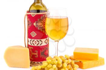 Wine, grapes and cheese isolated on white background.