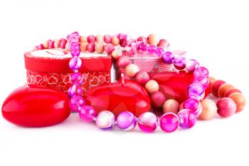 Red heart candles, necklaces and gift boxes isolated on white background.
