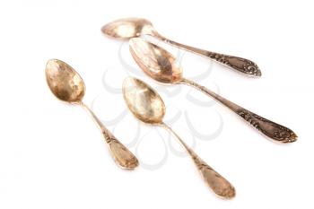 Vintage spoons isolated on white background.
