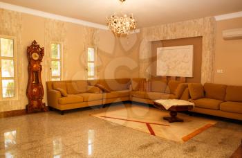 Brown and beige living room with luxurious design. 
