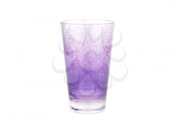 Violet plastic glass isolated on white background.