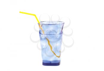 Plastic glass with water, ice cubes and straw isolated on white background.