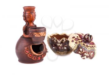 Armenian ancient doll souvenir for salt and pepper, pomegranate isolated on white background.